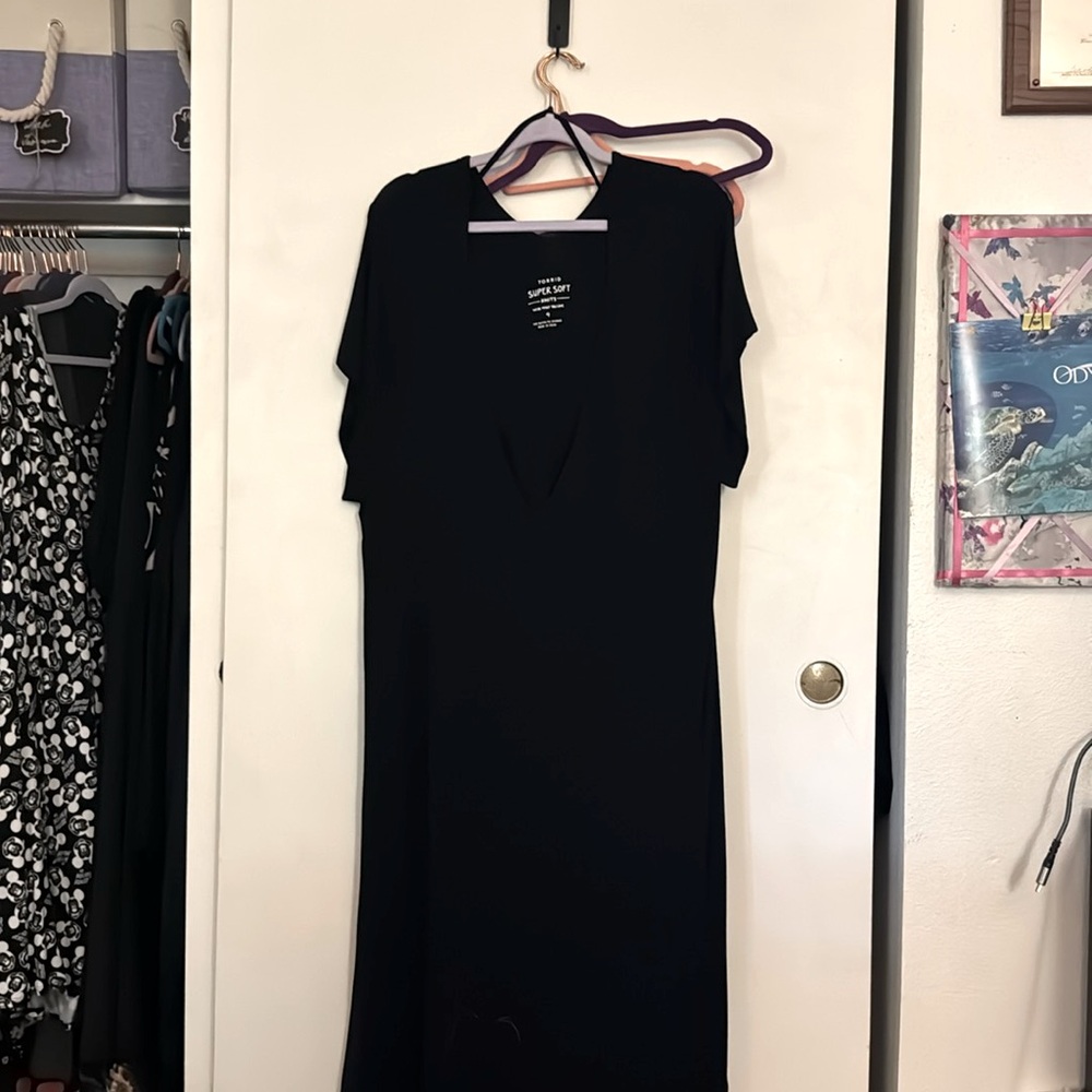 Torrid size 4 black knit dress with pockets.